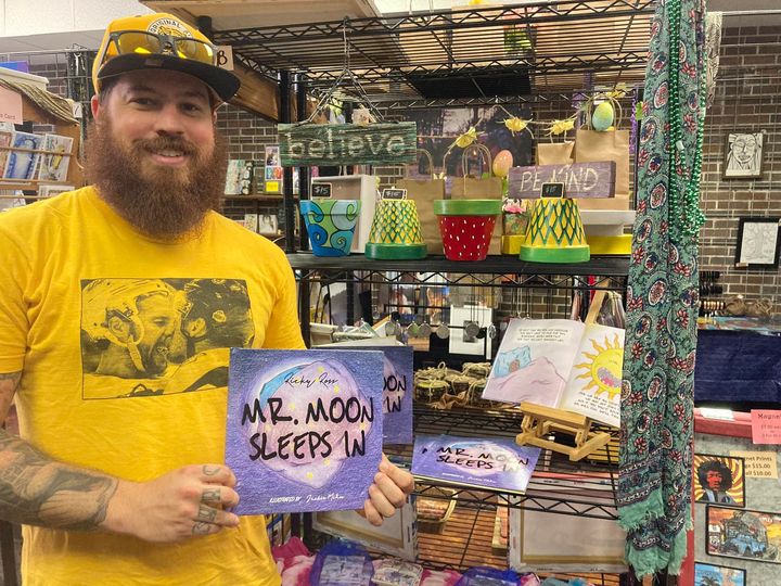 A local artist with his work